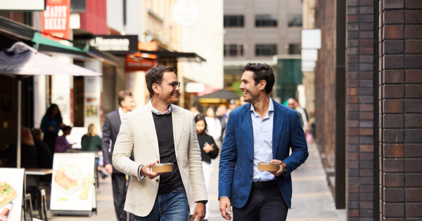An image of two businessmen getting lunch