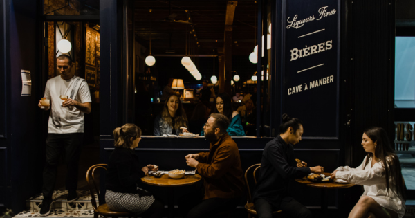 People outside a bar