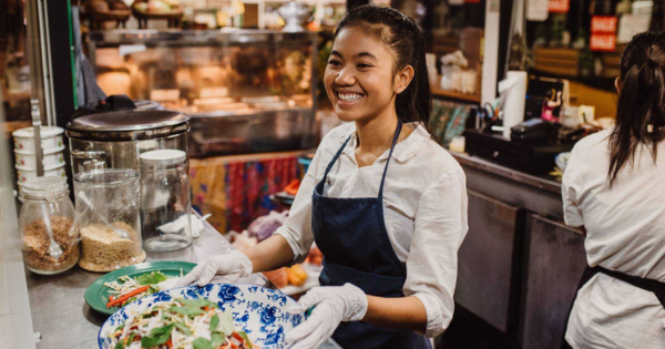 Woman working at a restaurant in the city
