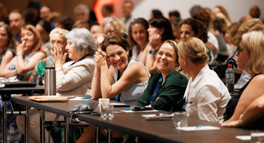 Women at a forum 